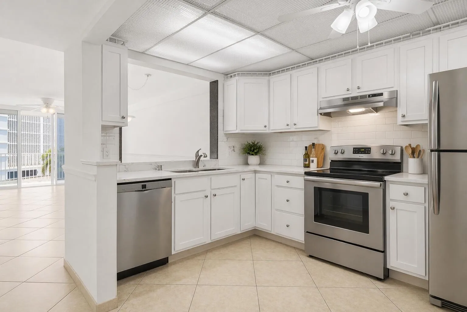 KITCHEN STAGED LOOKING INTO FAMILY AND D