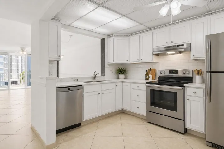 KITCHEN STAGED LOOKING INTO FAMILY AND D