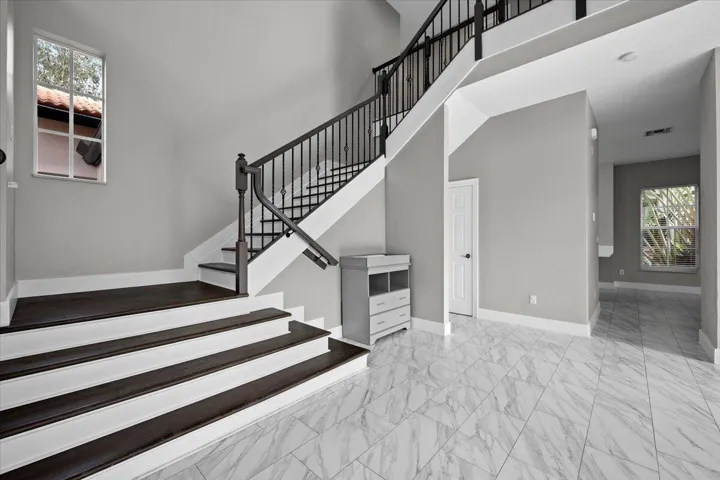Grand Staircase to Bedroom Area