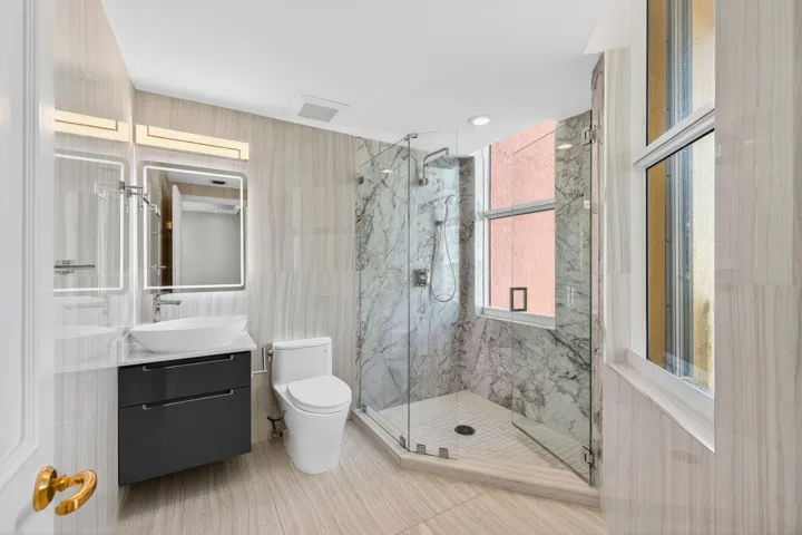Modern Glass-Enclosed Bathroom