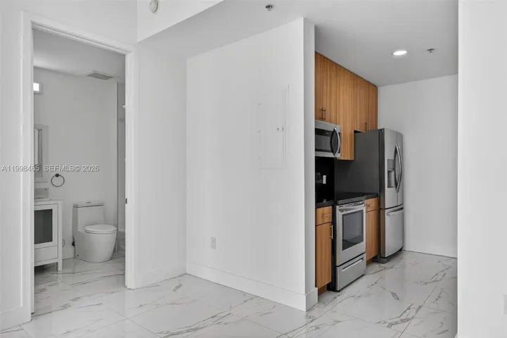 From living area bathroom on left