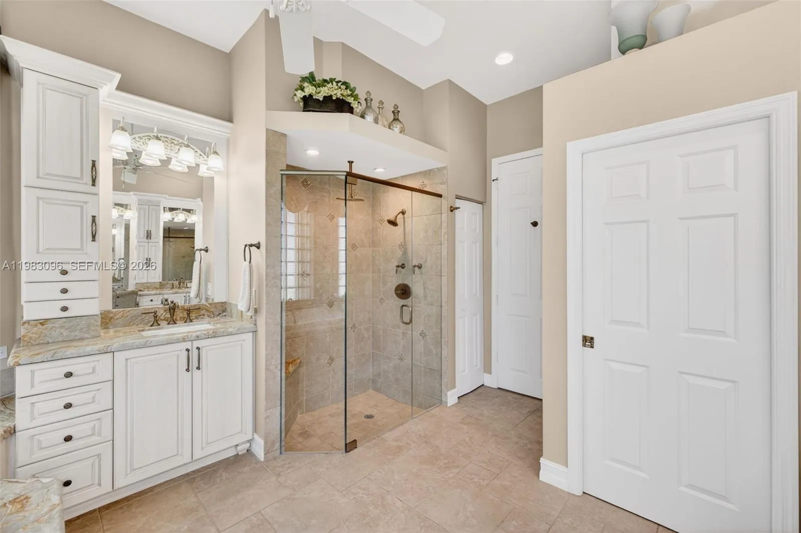 Upgraded primary bathroom w/ jetted tub and separate shower with rain head, plus separate vanities with custom millwork and tons of storage, plus makeup vanity. Water closet room separate Upgraded primary bathroom w/ jetted tub and separate shower with rain head, plus separate vanities with custom millwork and tons of storage, plus makeup vanity. Water closet room separate