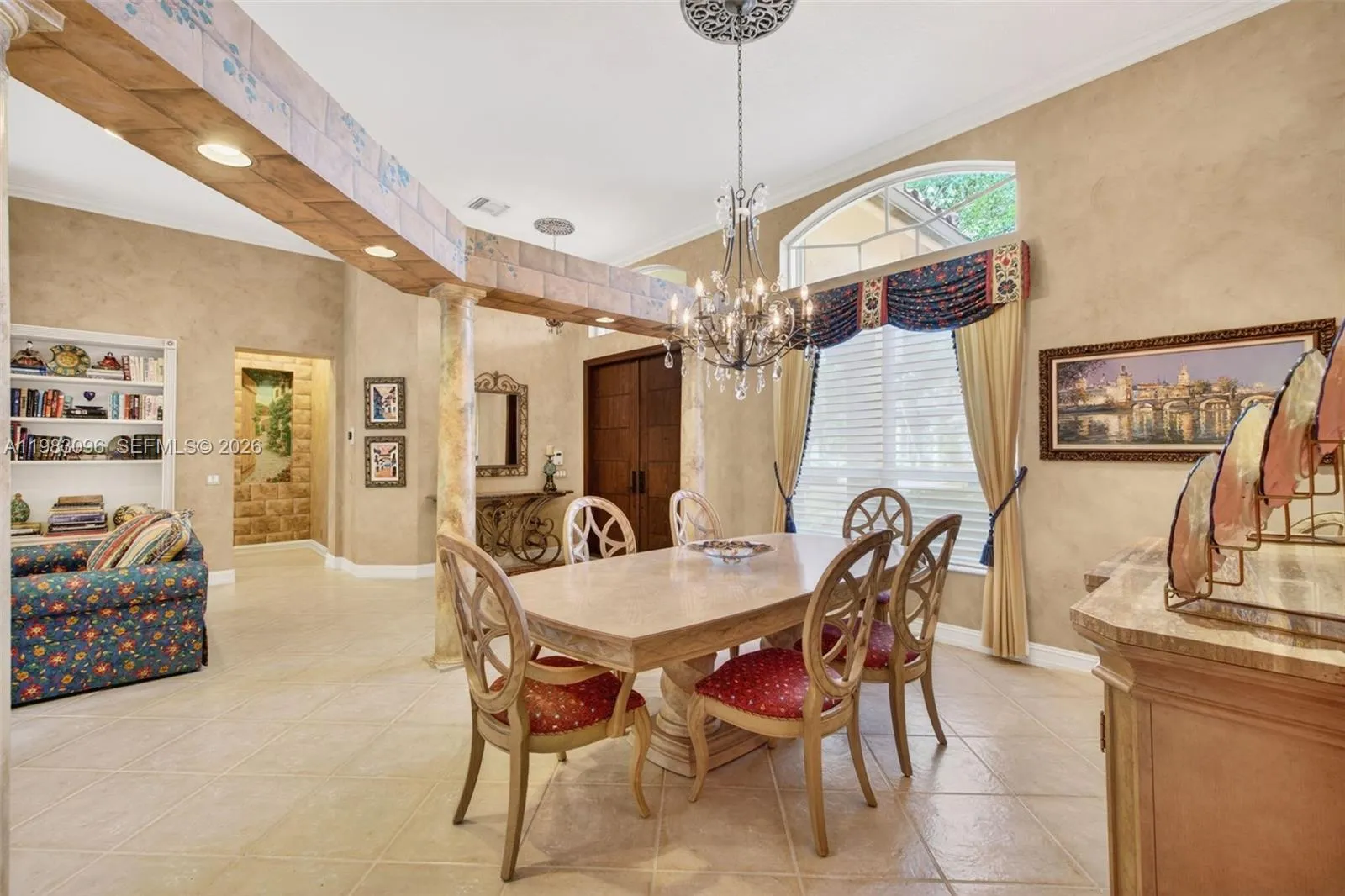 Wood burning fireplace, built in book shelves, volume ceilings, Beautiful handpainted murals and finishes resemble an al fresco restaurant in Europe Wood burning fireplace, built in book shelves, volume ceilings, Beautiful handpainted murals and finishes resemble an al fresco restaurant in Europe