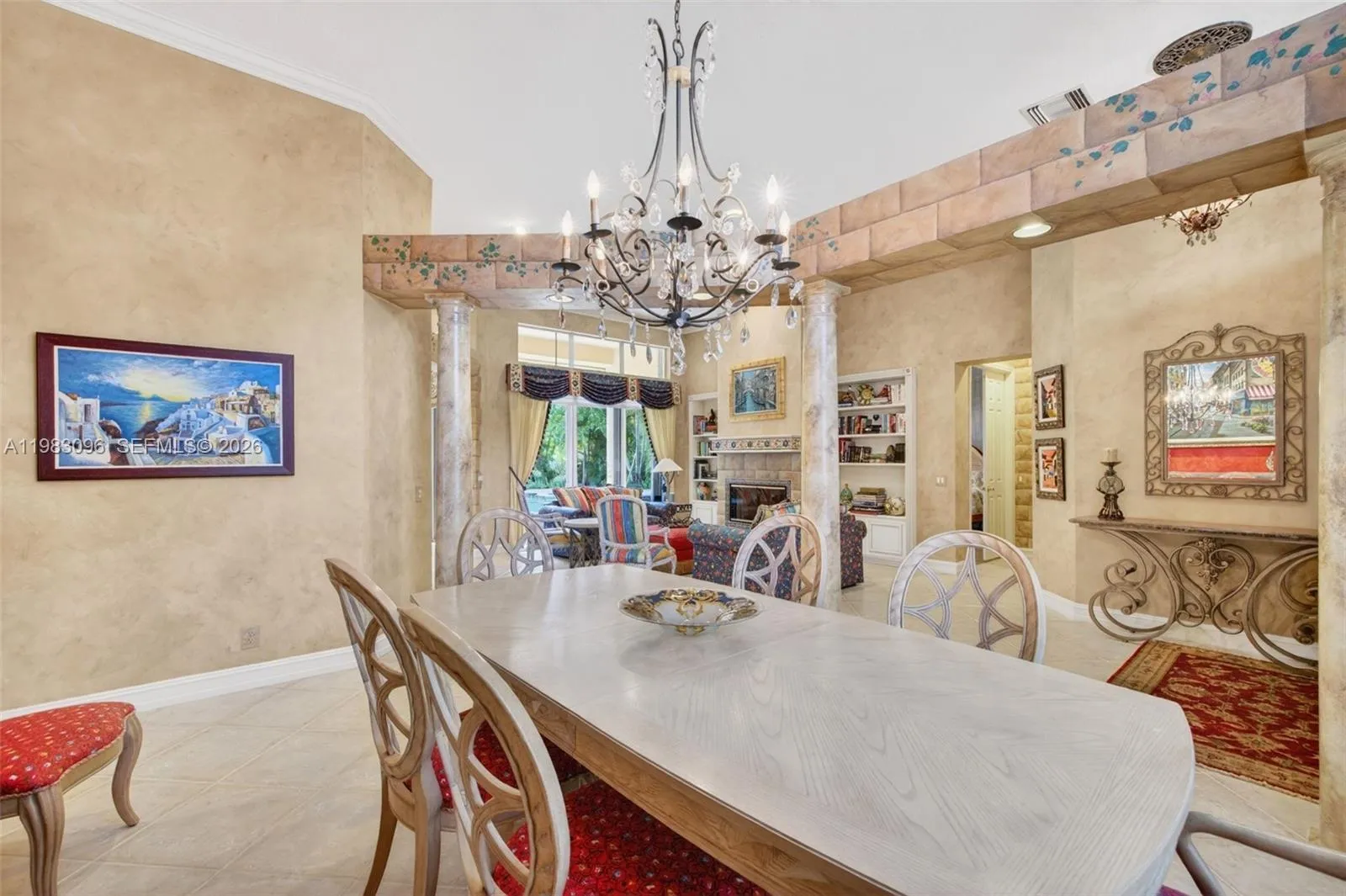 Wood burning fireplace, built in book shelves, volume ceilings, Beautiful handpainted murals and finishes resemble an al fresco restaurant in Europe Wood burning fireplace, built in book shelves, volume ceilings, Beautiful handpainted murals and finishes resemble an al fresco restaurant in Europe