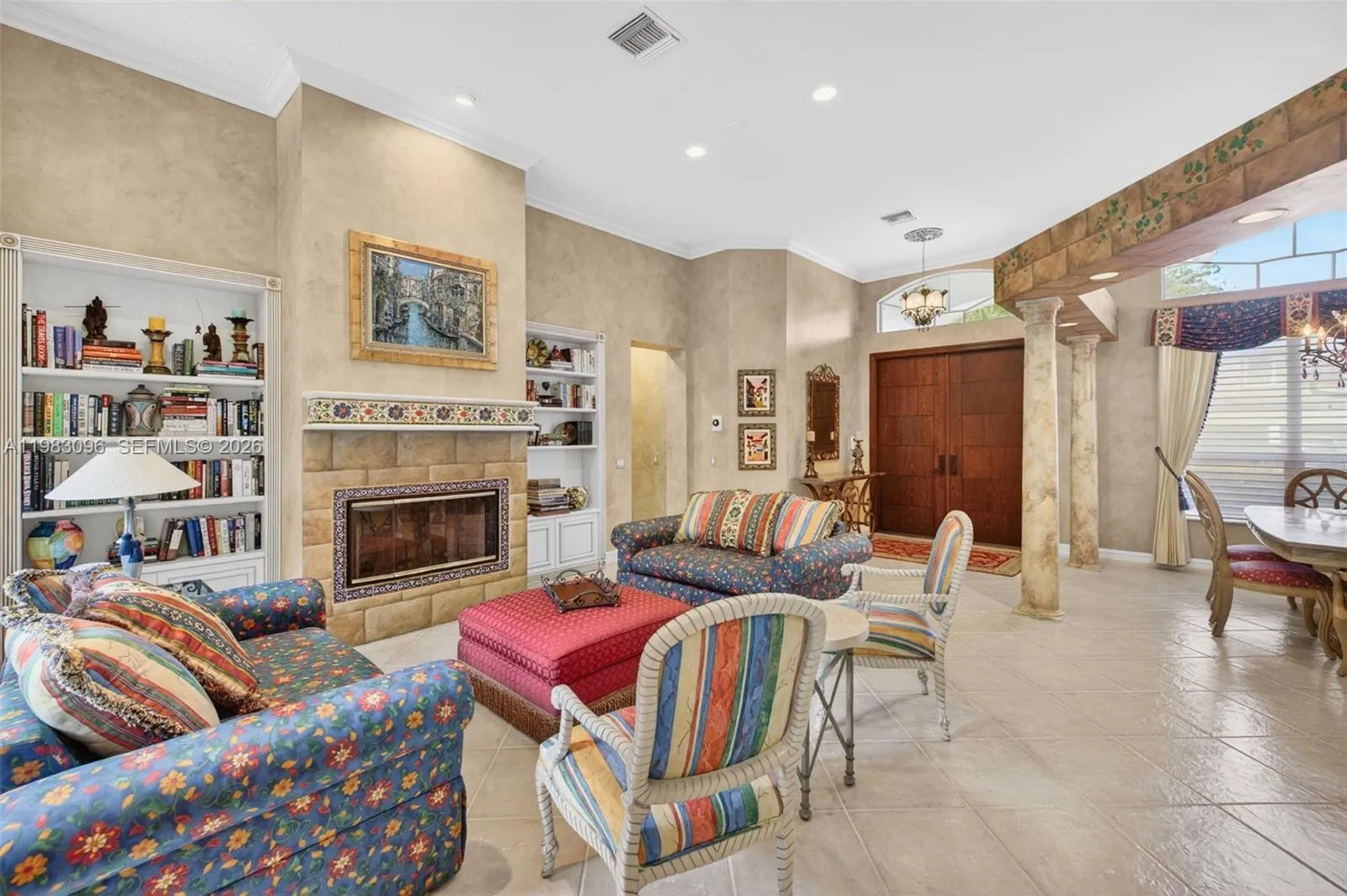 Wood burning fireplace, built in book shelves, volume ceilings, Beautiful handpainted murals and finishes resemble an al fresco restaurant in Europe Wood burning fireplace, built in book shelves, volume ceilings, Beautiful handpainted murals and finishes resemble an al fresco restaurant in Europe