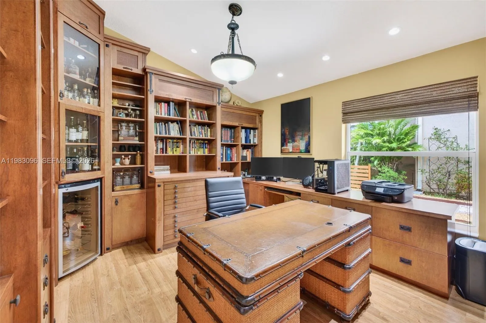 Bedroom converted to custom office w/ gorgeous wood built-ins, file cabinets and beverage cooler Bedroom converted to custom office w/ gorgeous wood built-ins, file cabinets and beverage cooler