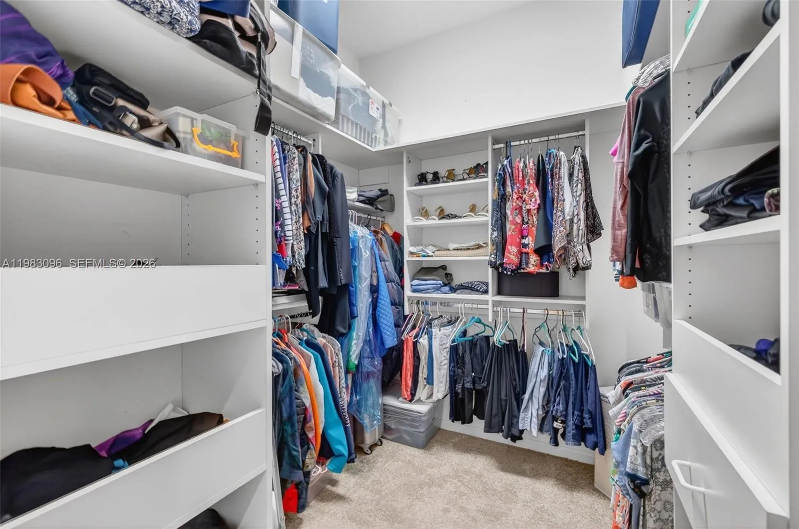 1 of 2 primary bedroom walk in closets 1 of 2 primary bedroom walk in closets