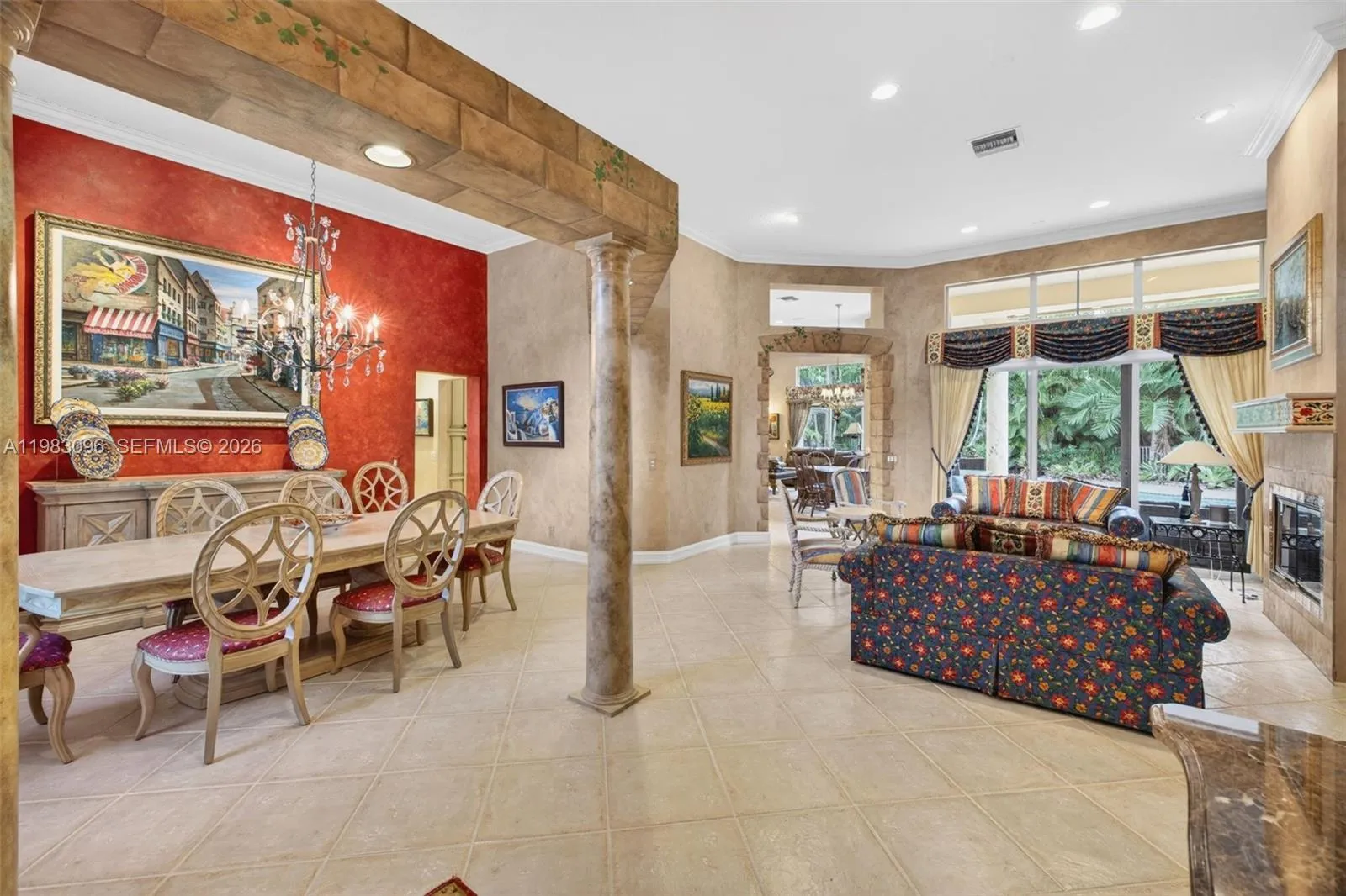 Foyer entrance view toward formal dining room with open concept view to back yard, volume ceilings and high hat lighting plus tile on diagonal. Beautiful handpainted murals and finishes resemble an al fresco restaurant in Europe Foyer entrance view toward formal dining room with open concept view to back yard, volume ceilings and high hat lighting plus tile on diagonal. Beautiful handpainted murals and finishes resemble an al fresco restaurant in Europe