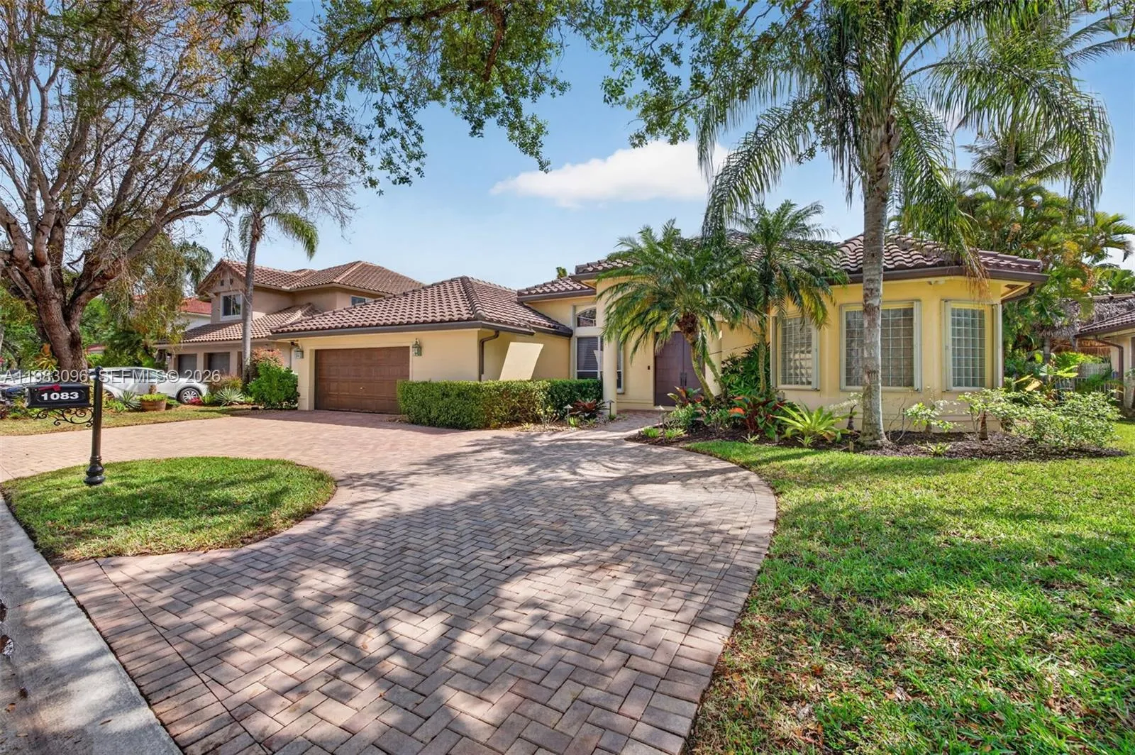 Oversized circular driveway, custom home being sold by original homeowner. EV hookup for electric car. Cul d sac, paver driveway and landscape lighting street Oversized circular driveway, custom home being sold by original homeowner. EV hookup for electric car. Cul d sac, paver driveway and landscape lighting street