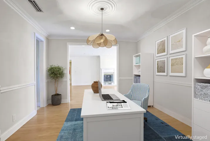 Virtually staged - Home office. Currently is a formal dining room.