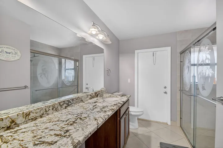 PRIMARY BATH W/ACCESS TO POOL/PATIO