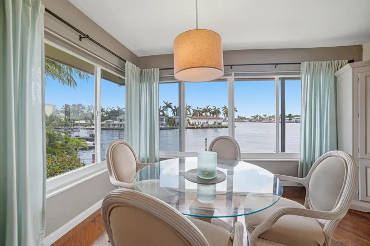 Combo Florida and dining room with view to the waterways.