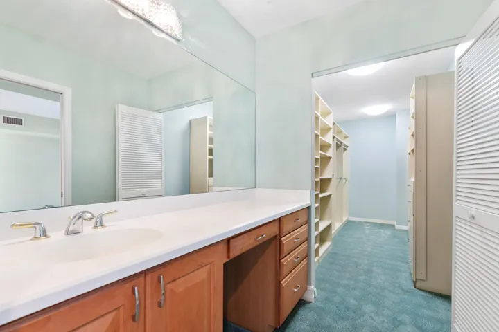 Main bedroom vanity and walk-in closet