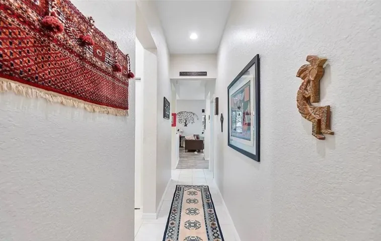 Hallway, Please not this property is now vacant and all interior picture holes have been filled & all interior has been painted with brand new modern paint "crushed ice" with white trim, It looks superb!