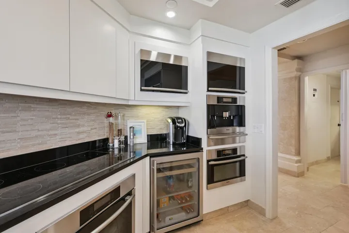 Stainless appliances, Miele cappuccino maker and wall oven