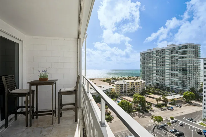 Marble floor continues onto your private balcony. Enjoy sunrises and sweeping ocean views.