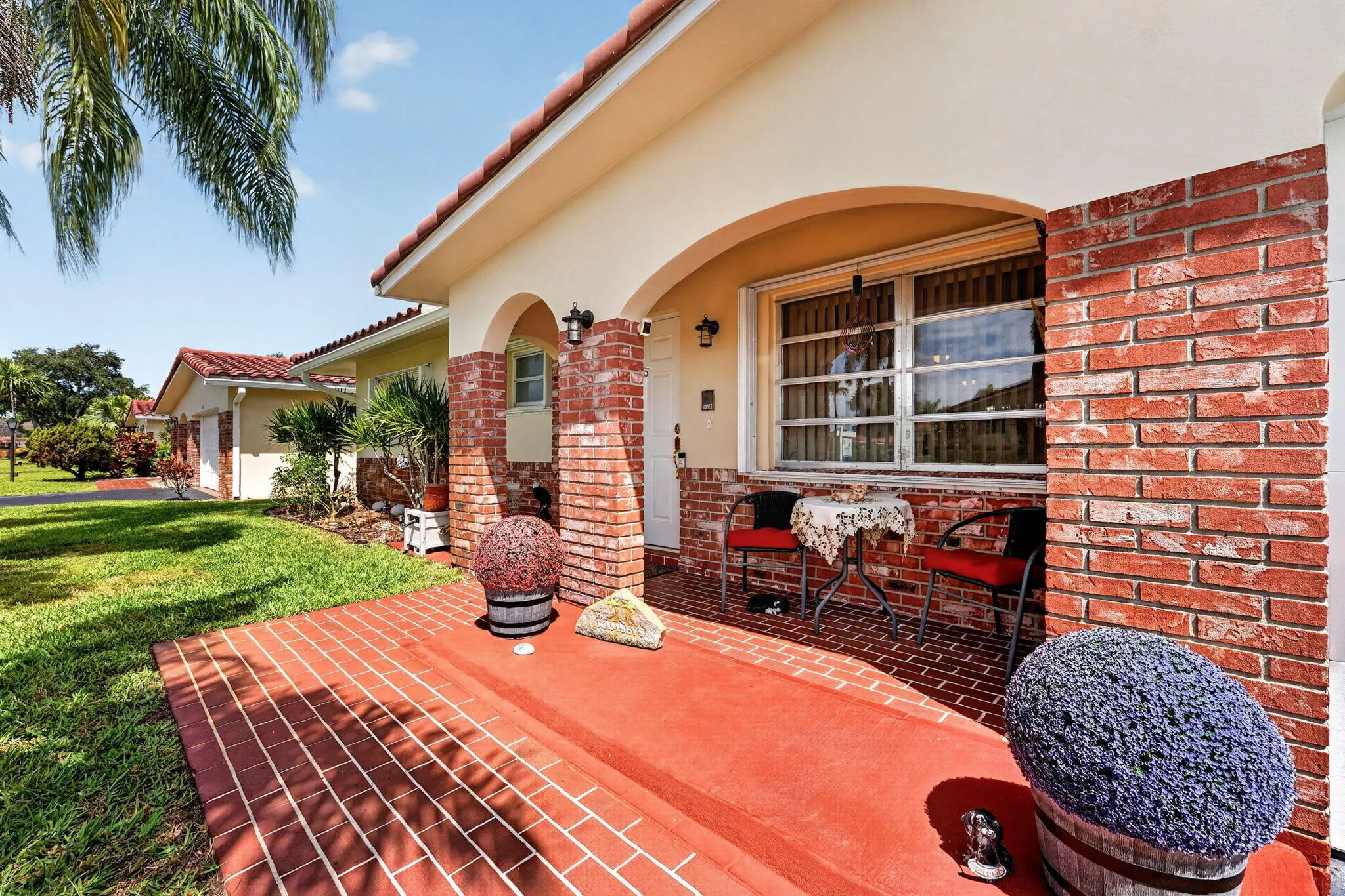 Inviting covered front porch sitting