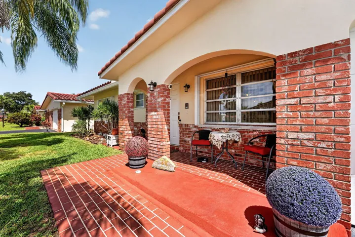 Inviting covered front porch sitting