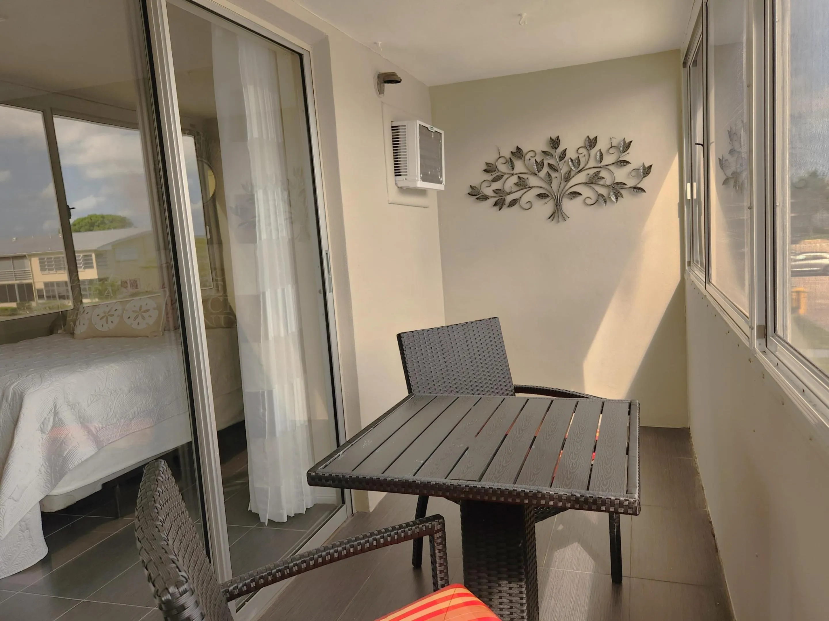 Balcony with sliders to bedroom