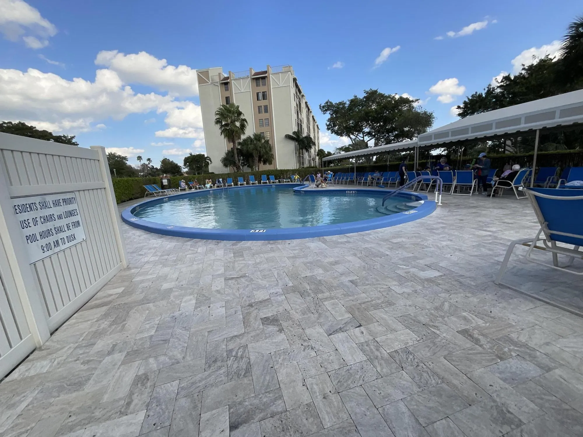 Pool is next to building