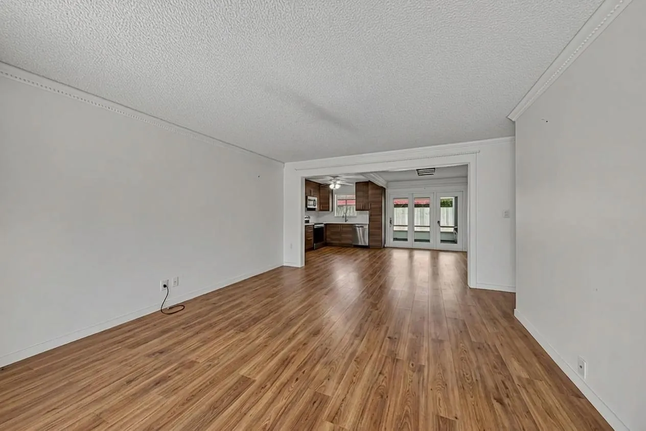 Staged with updated floors and kitchen