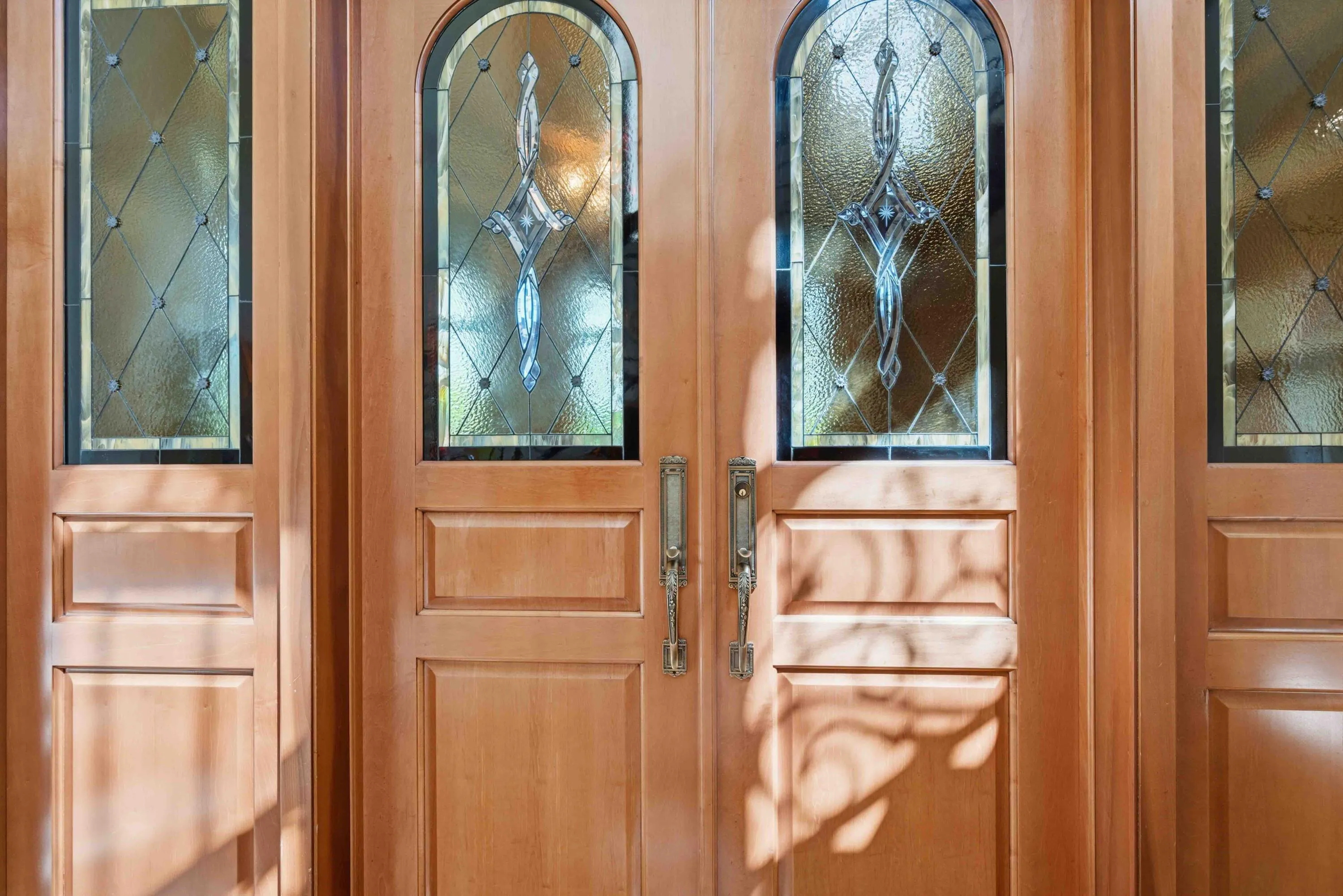 Double Stained Glass Doors Lead into Home Office