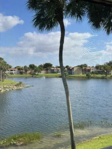 Long water view from screened in patio
