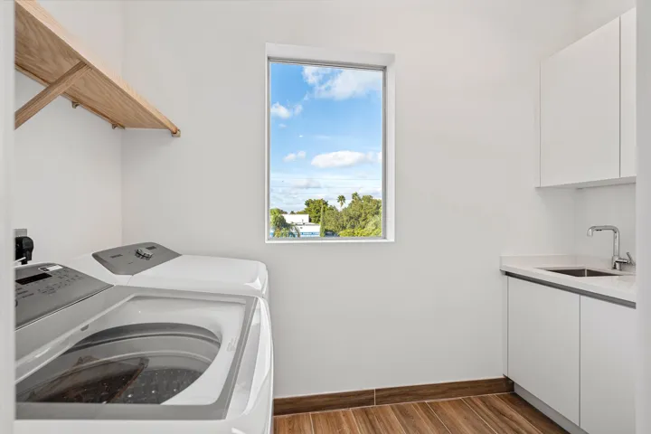 Walk-in laundry located near primary and guest 3rd floor bedrooms makes laundry hassle free.