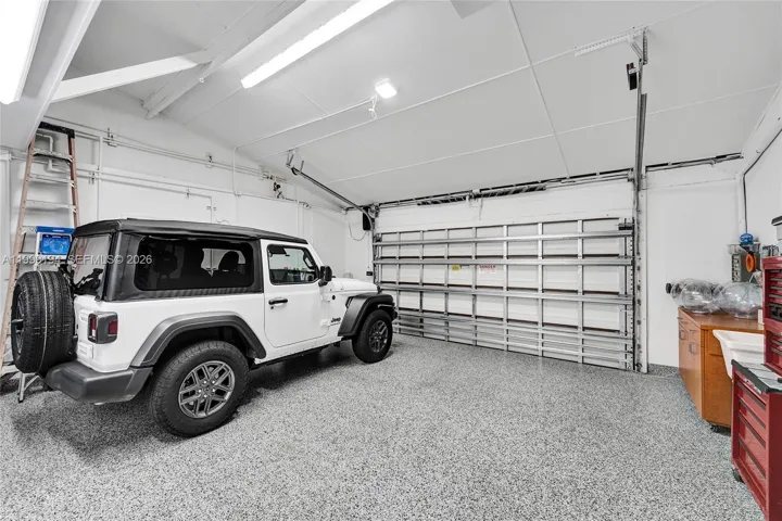 Wall mount door opener with volume ceilings