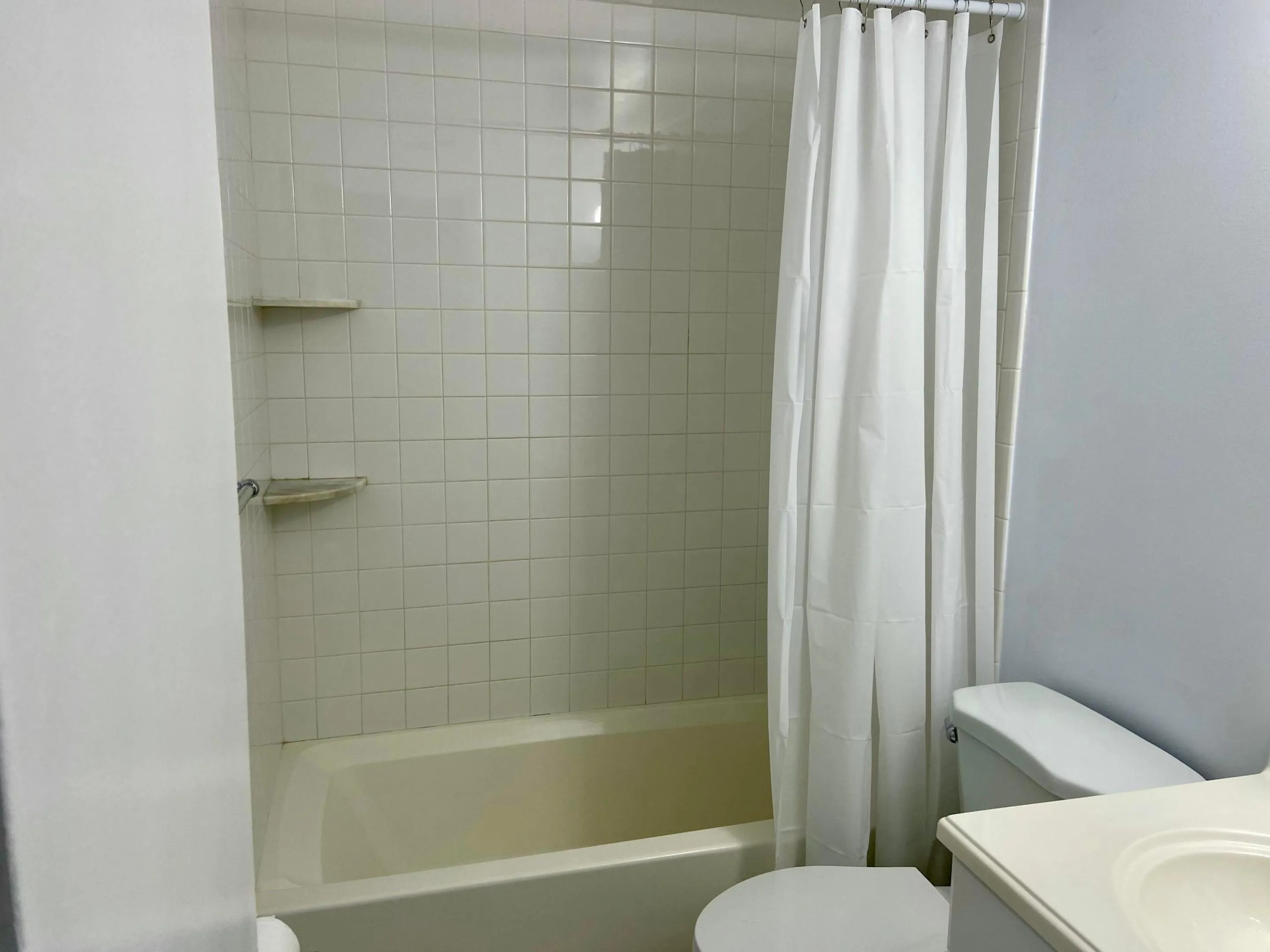 Bath with tub/shower combination