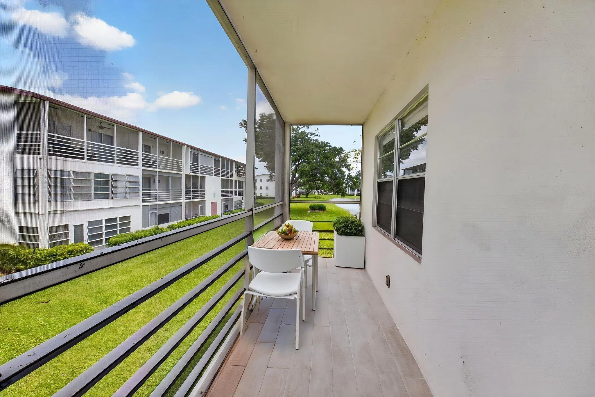 Screened in balcony with water view