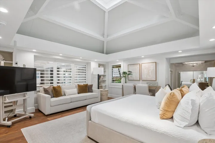 Primary Suite with vaulted ceiling and skylight (main house)