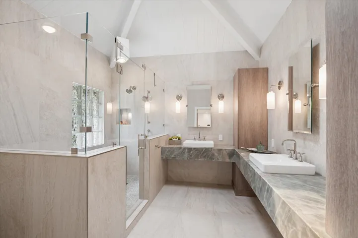 Primary ensuite with oversized shower, dual sinks and automatic Toto bidet toilet