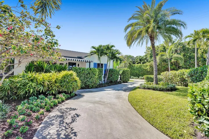 Charming corner property just steps from Atlantic Avenue, offering exceptional curb appeal in the heart of downtown Delray Beach.