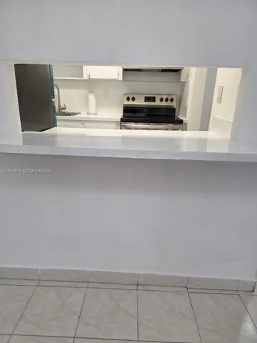 PASS THRU WINDOW FROM KITCHEN TO DINING AREA