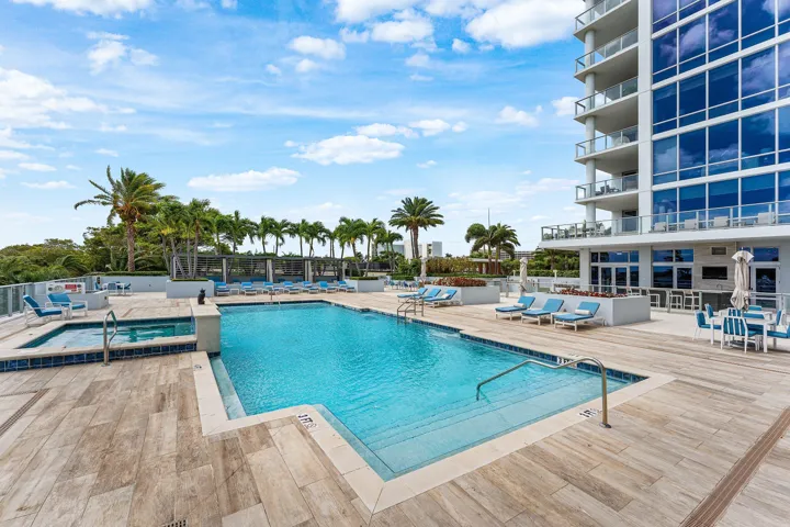 Expansive Pool Deck w Spa