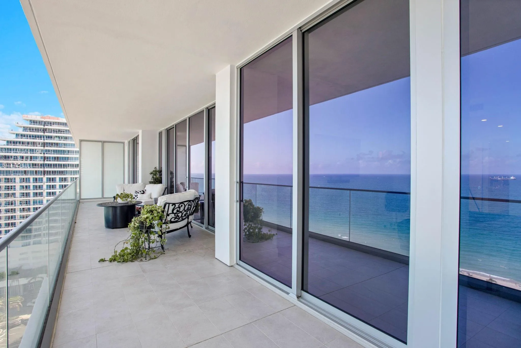 Balcony, living area, Owner’s Suite, and Guest Suite