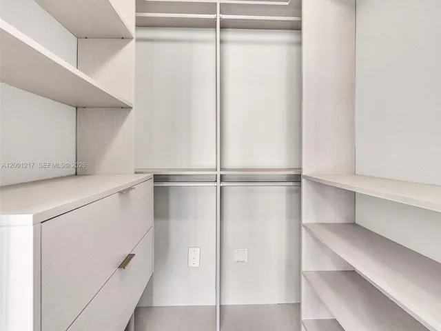Primary Bedroom Walk in Closet California Style