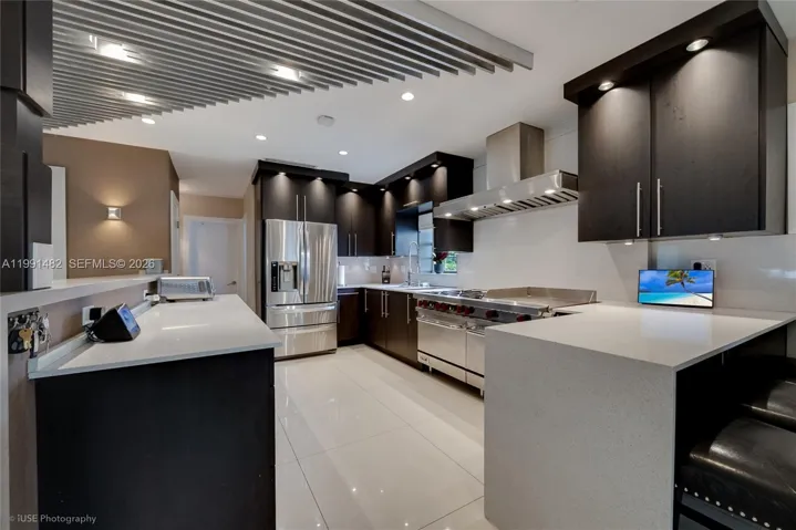 TRUE Chef's Kitchen with Double Ovens, 6 Burners, & 24" Teppenyaki Griddle