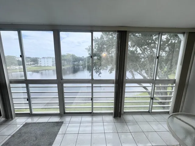 FLOOR TO CEILING GLASS ENCLOSURE