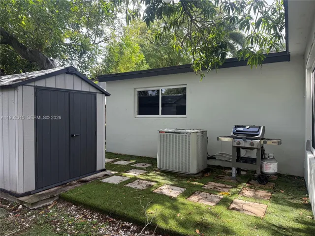 Shed and astro turf with pavers were recently added