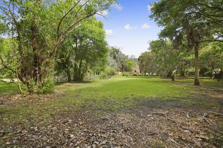 1.36 acres. Private and wonderful spot to play football, frisbee, gardening, or simply enjoying natural beauty.