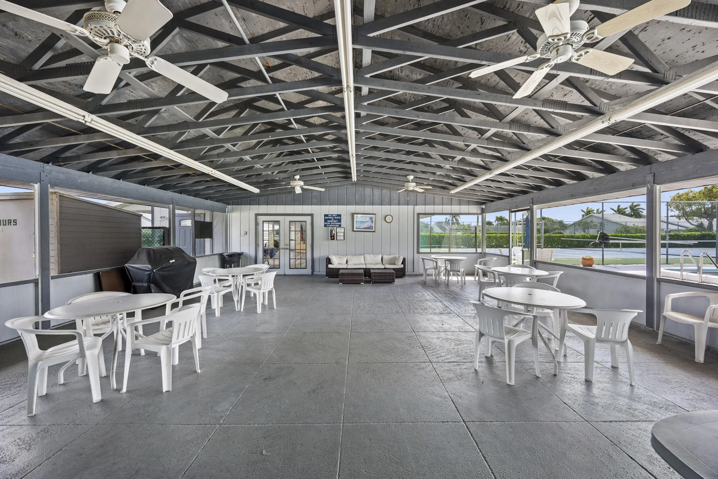 Enjoy resort-style living with this spacious community pool just steps away, offering plenty of room for lounging, soaking up the sun, and relaxing with friends and neighbors. Surrounded by ample seating and shaded areas, it’s the perfect spot to unwind and enjoy the South Florida lifestyle.
