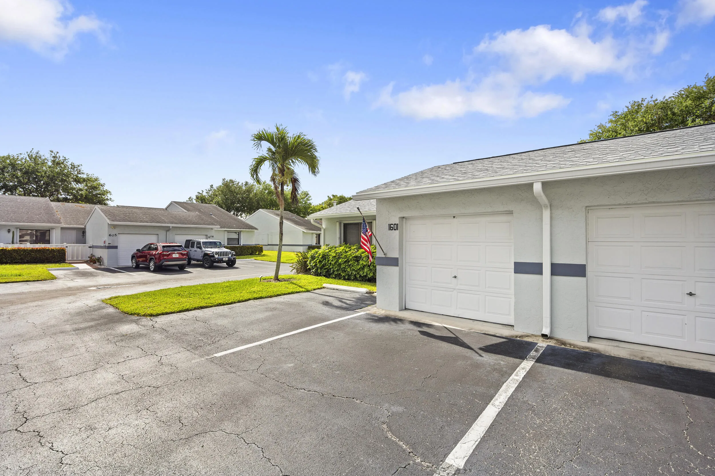 Charming 2/2 villa with a clean, well-maintained exterior, surrounded by lush landscaping and a welcoming approach that sets the tone from the moment you arrive.