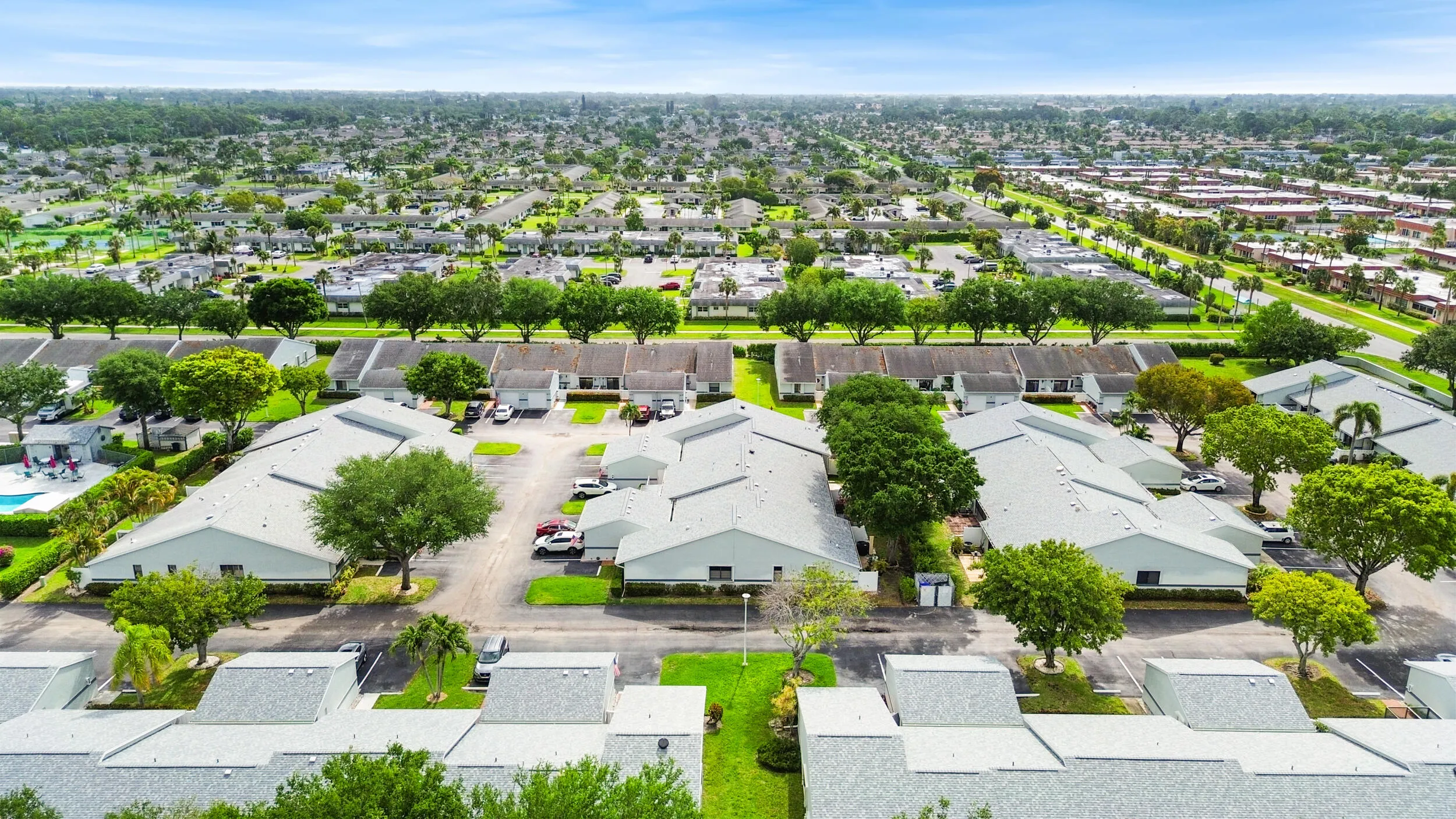 Beautifully maintained and thoughtfully laid out, this charming community offers a peaceful residential setting with lush landscaping, mature trees, and a welcoming neighborhood feel. From above, you can truly appreciate the spacious layout, ample parking, and the blend of privacy and connectivity that makes this location so desirable. Ideally located in West Palm Beach, you’ll enjoy a serene environment while remaining close to shopping, dining, major roadways, and all the conveniences of South Florida living.