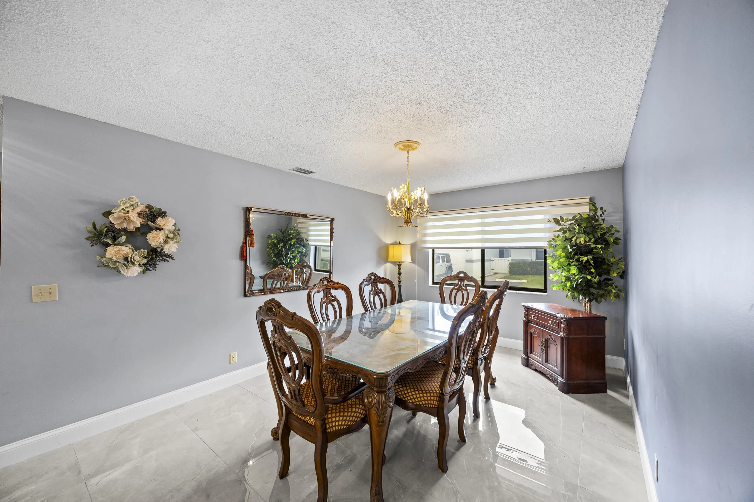 Spacious dining area with an open feel, offering plenty of room for gatherings and seamlessly connecting to the main living spaces for easy everyday living and entertaining.