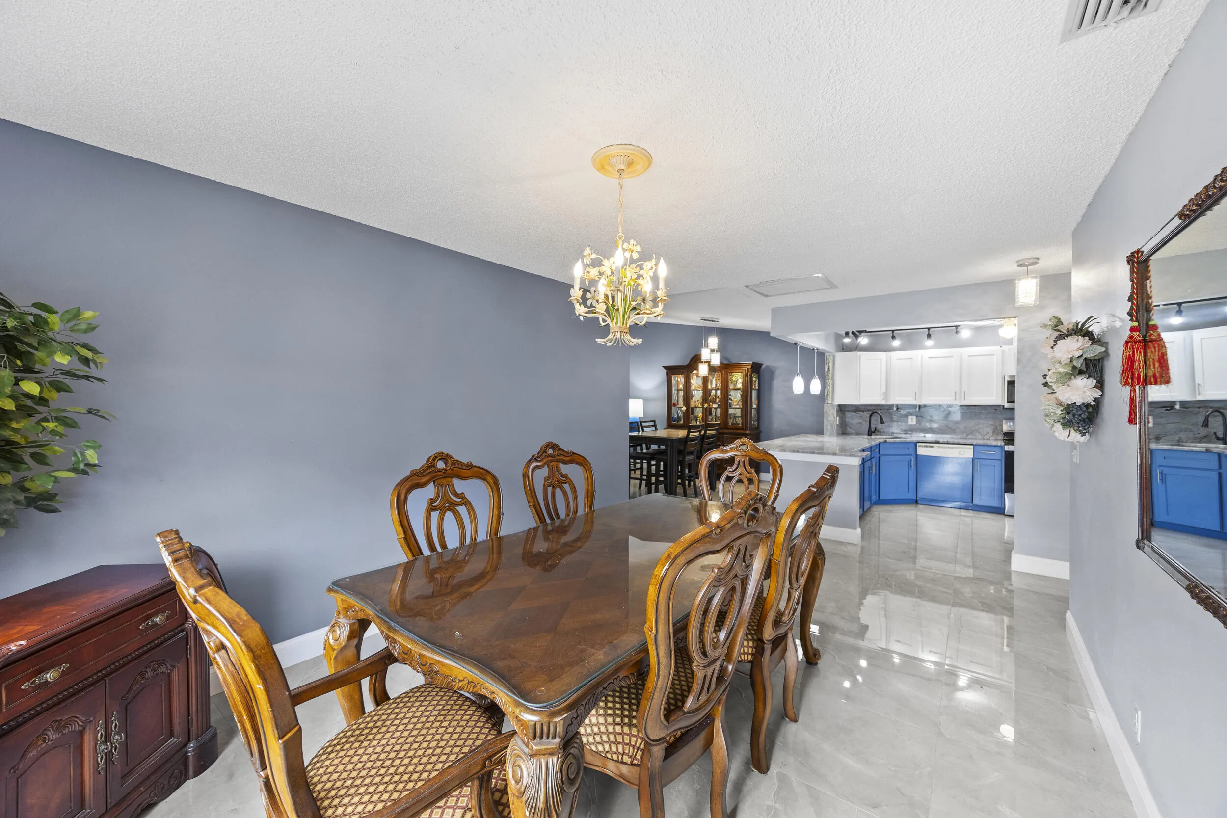Spacious dining area with an open feel, offering plenty of room for gatherings and seamlessly connecting to the main living spaces for easy everyday living and entertaining.