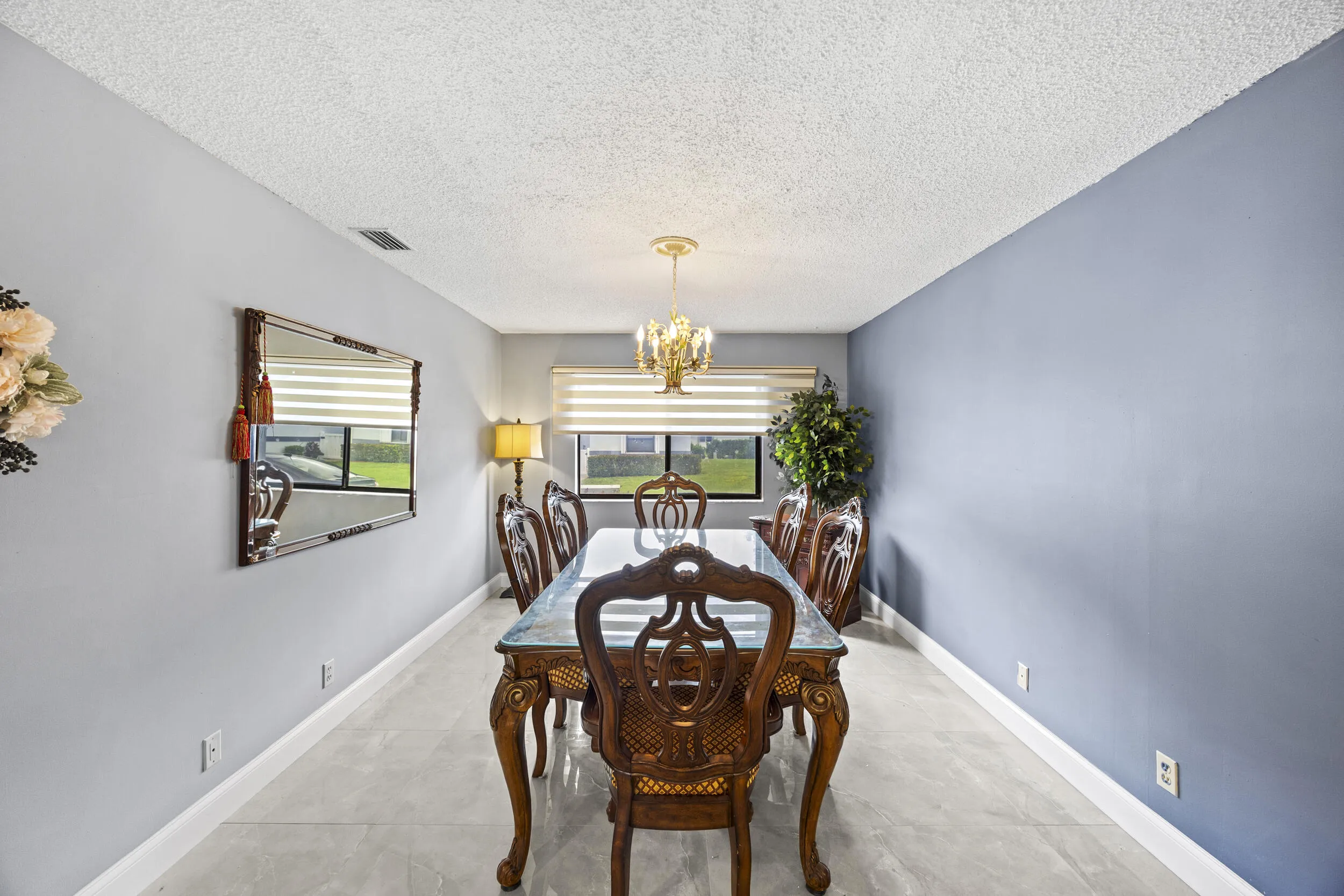 Spacious dining area with an open feel, offering plenty of room for gatherings and seamlessly connecting to the main living spaces for easy everyday living and entertaining.