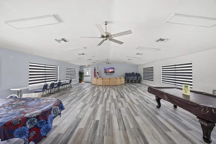 Enjoy resort-style living with this spacious community pool just steps away, offering plenty of room for lounging, soaking up the sun, and relaxing with friends and neighbors. Surrounded by ample seating and shaded areas, it’s the perfect spot to unwind and enjoy the South Florida lifestyle.