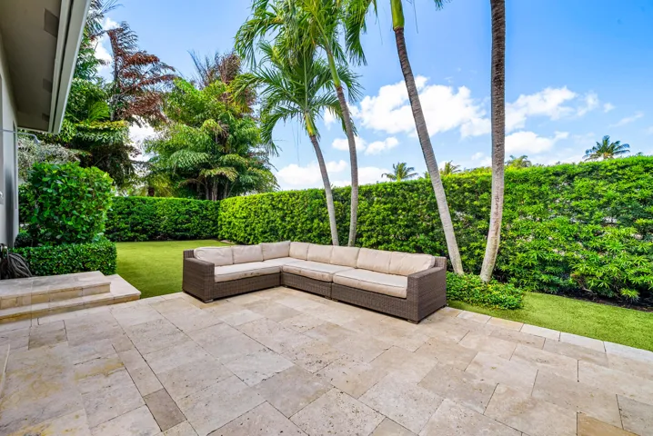 Backyard has artificial turf and is very private.
